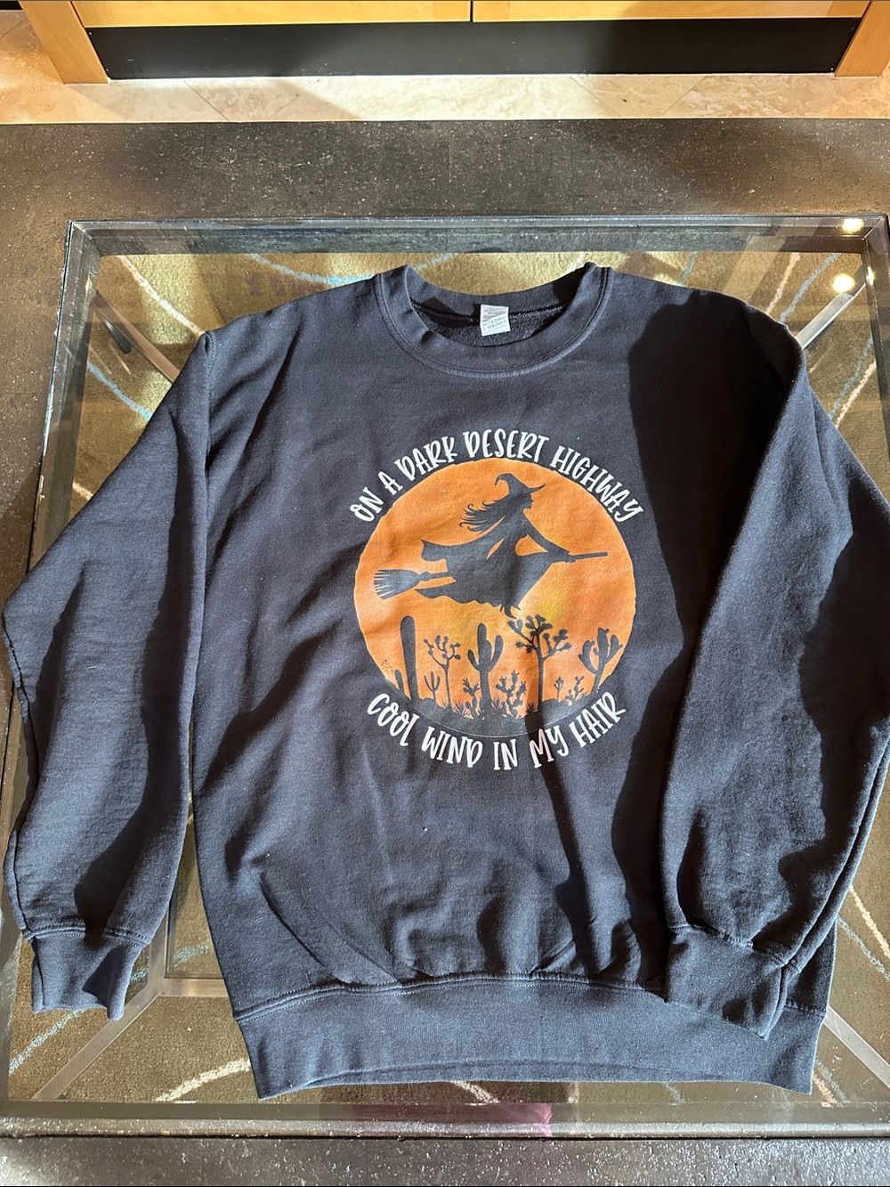 Gildan Black Crewneck Sweatshirt with Orange Desert Witch Graphic